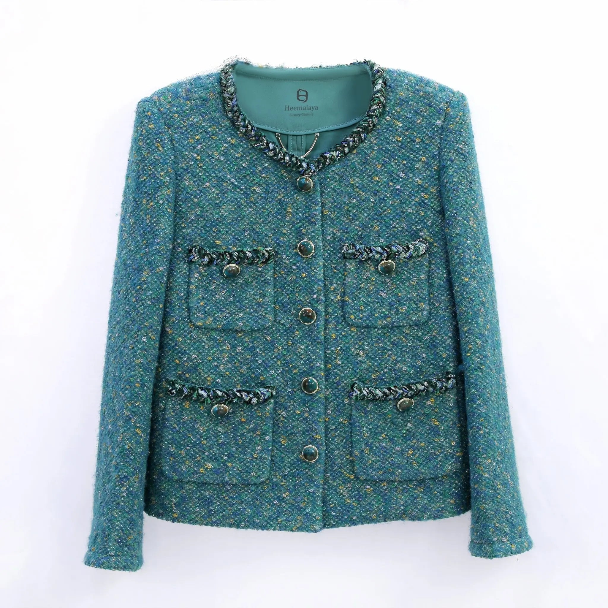 front view of green tweed outfit with gemstone button